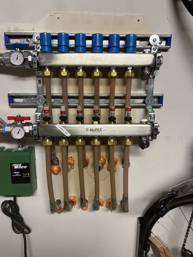 Plumber performing Water Heater Repair at a residential property in New Martinsville